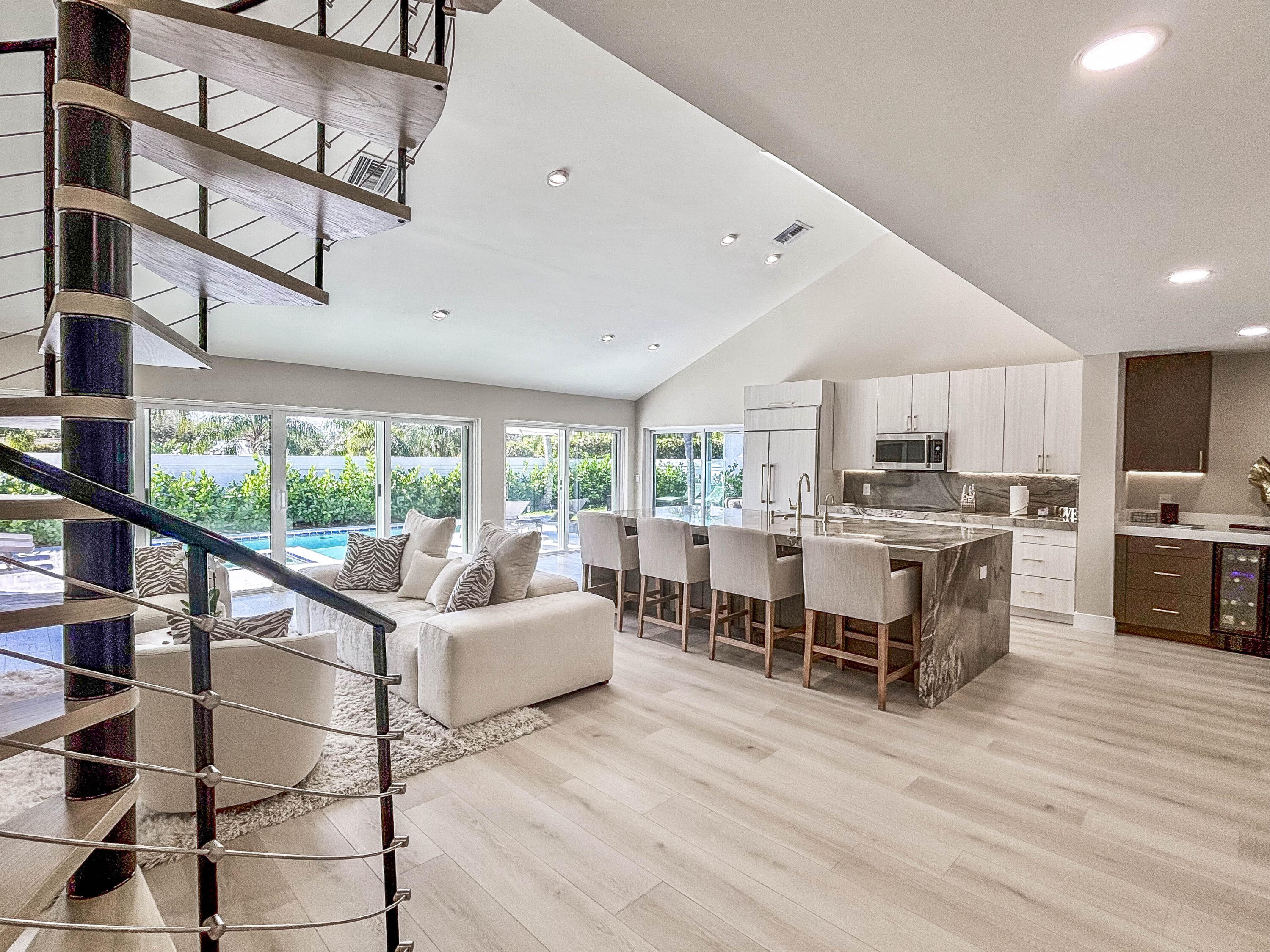 228 Ridge Road Jupiter, FL 33477 - Photo 3 of 13 a living room with furniture and a large window