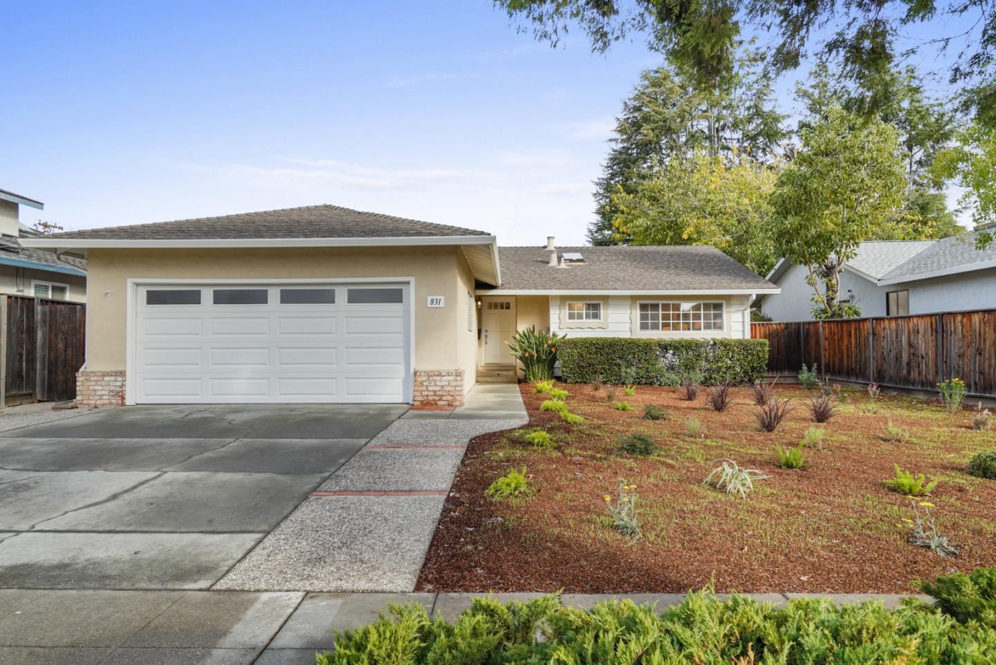 831 Flin Way Sunnyvale, CA 94087 - Photo 1 of 55 a front view of a house with a yard