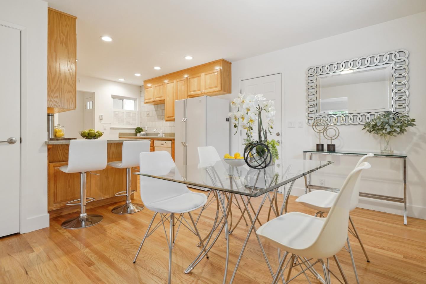 831 Flin Way Sunnyvale, CA 94087 - Photo 11 of 55 a view of a dining room with furniture and wooden floor