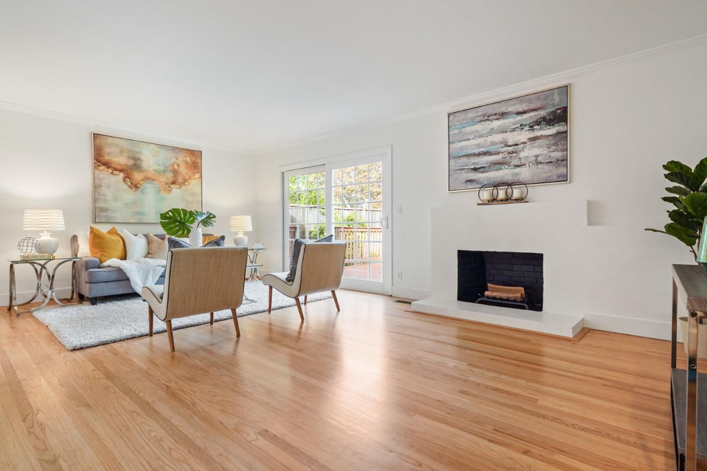 831 Flin Way Sunnyvale, CA 94087 - Photo 13 of 55 a living room with furniture and a fireplace
