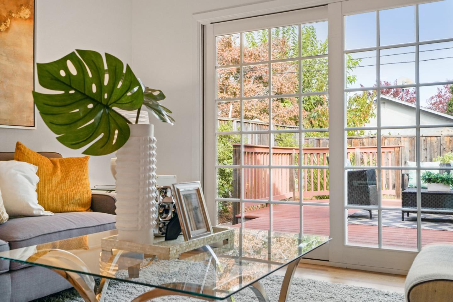 831 Flin Way Sunnyvale, CA 94087 - Photo 17 of 55 a view of a dining room with furniture a chandelier and wooden floor