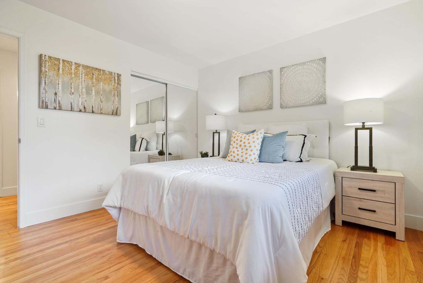 831 Flin Way Sunnyvale, CA 94087 - Photo 19 of 55 a bedroom with a bed and wooden floor