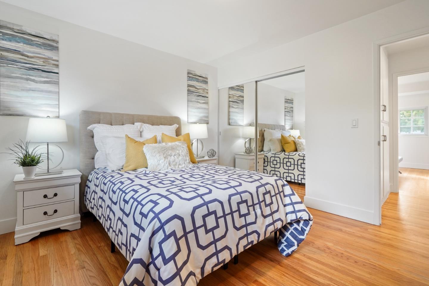 831 Flin Way Sunnyvale, CA 94087 - Photo 22 of 55 a bedroom with a bed and wooden floor