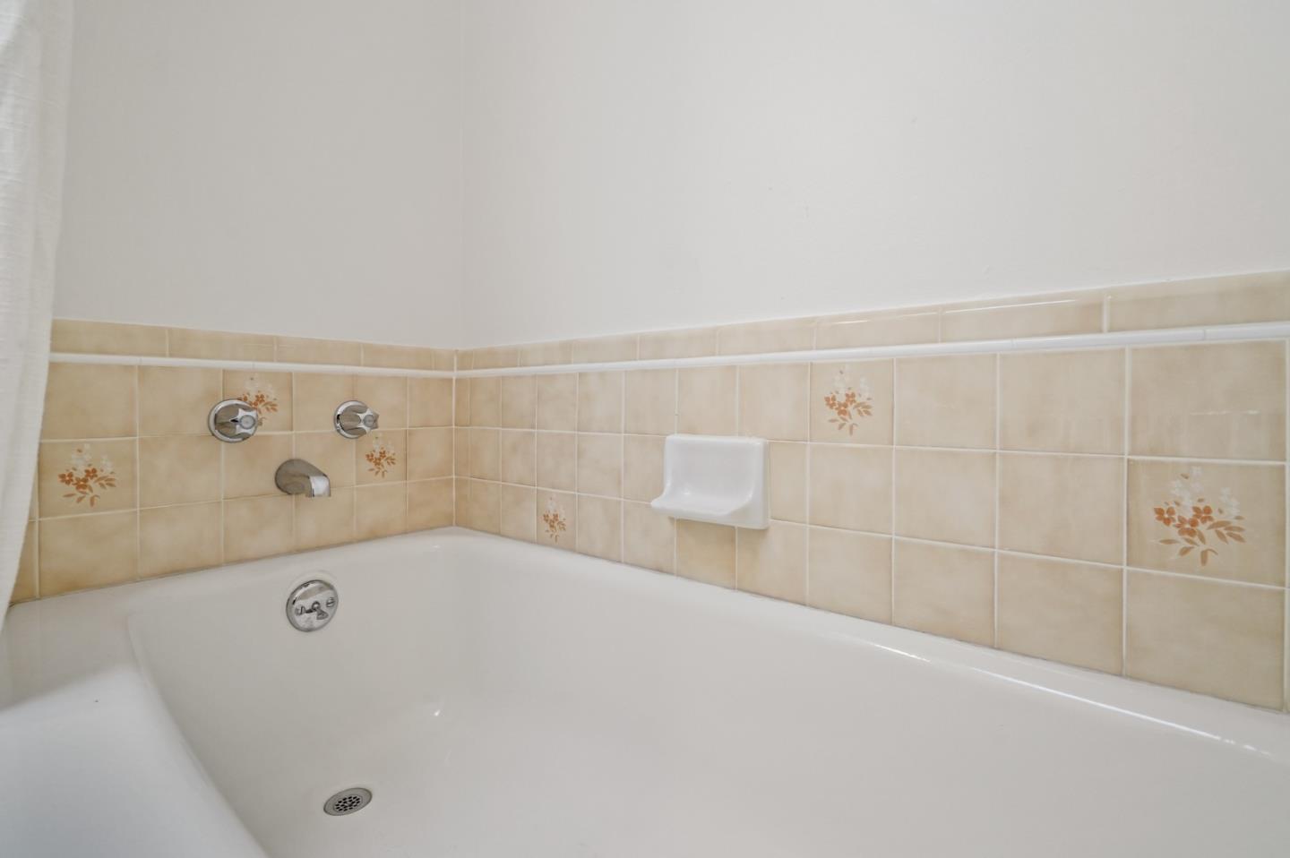 831 Flin Way Sunnyvale, CA 94087 - Photo 24 of 55 a bathroom with a bathtub