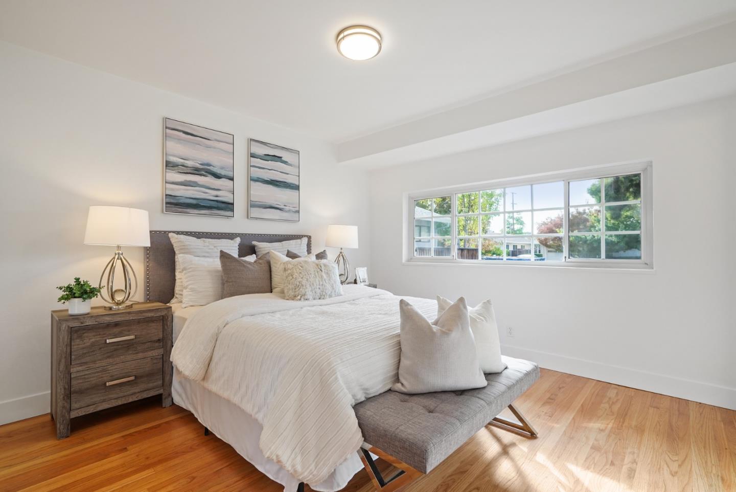 831 Flin Way Sunnyvale, CA 94087 - Photo 25 of 55 a bedroom with a bed and window