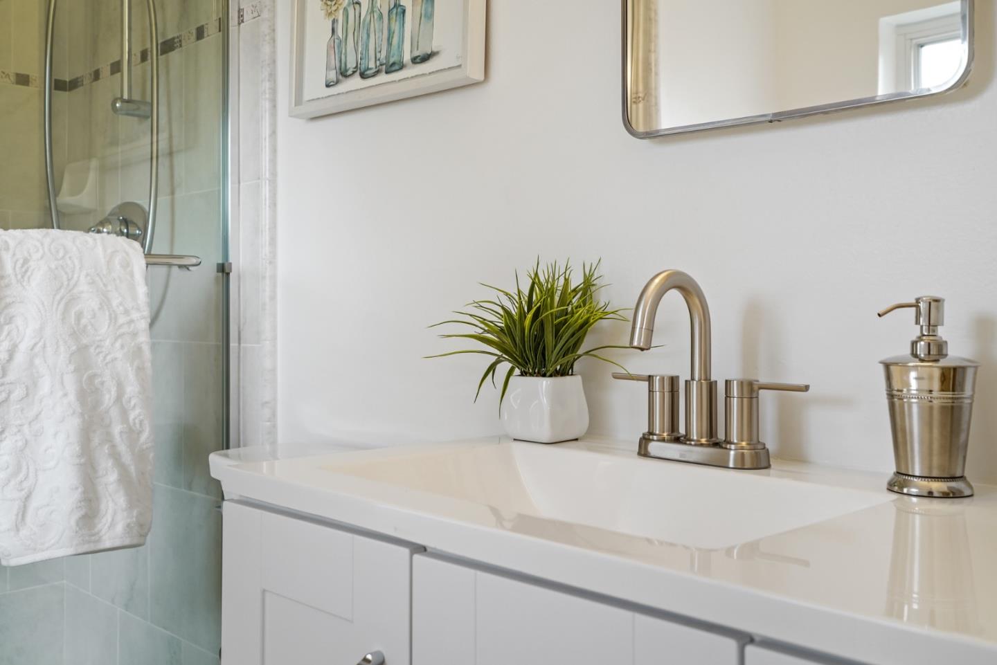 831 Flin Way Sunnyvale, CA 94087 - Photo 30 of 55 a bathroom with a shower curtain and a sink