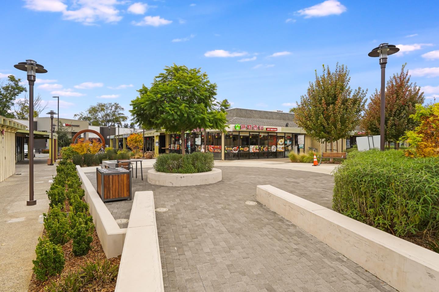 831 Flin Way Sunnyvale, CA 94087 - Photo 49 of 55 a view of a park with plants and a bench
