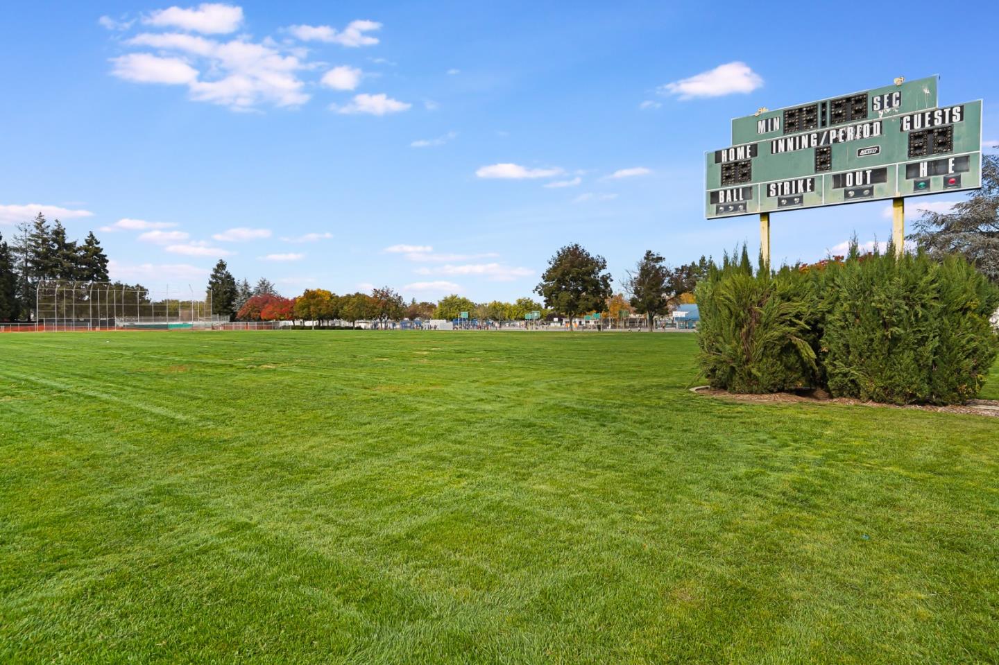 831 Flin Way Sunnyvale, CA 94087 - Photo 53 of 55 a yellow building with trees in the background