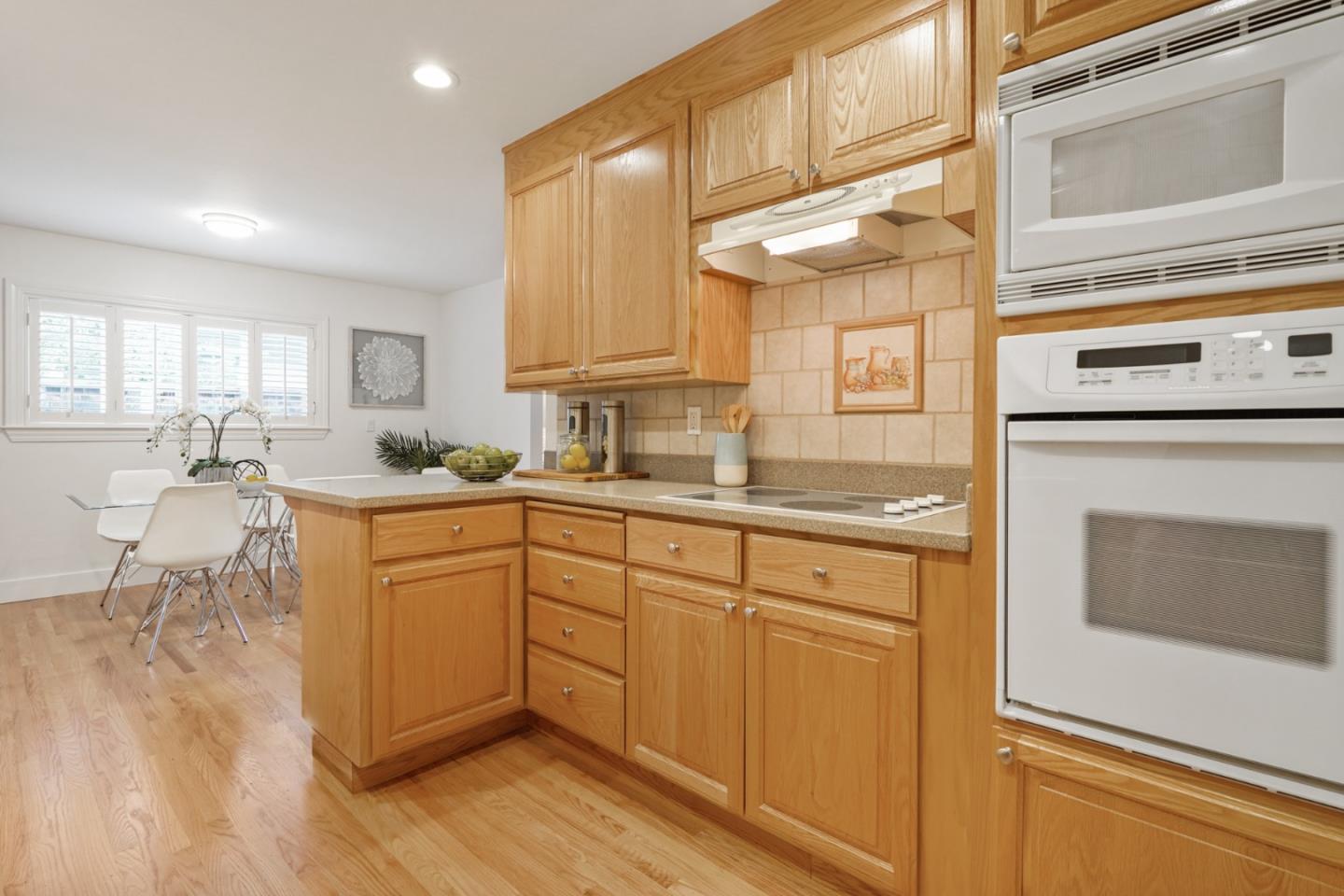 831 Flin Way Sunnyvale, CA 94087 - Photo 9 of 55 a kitchen with cabinets appliances and a window