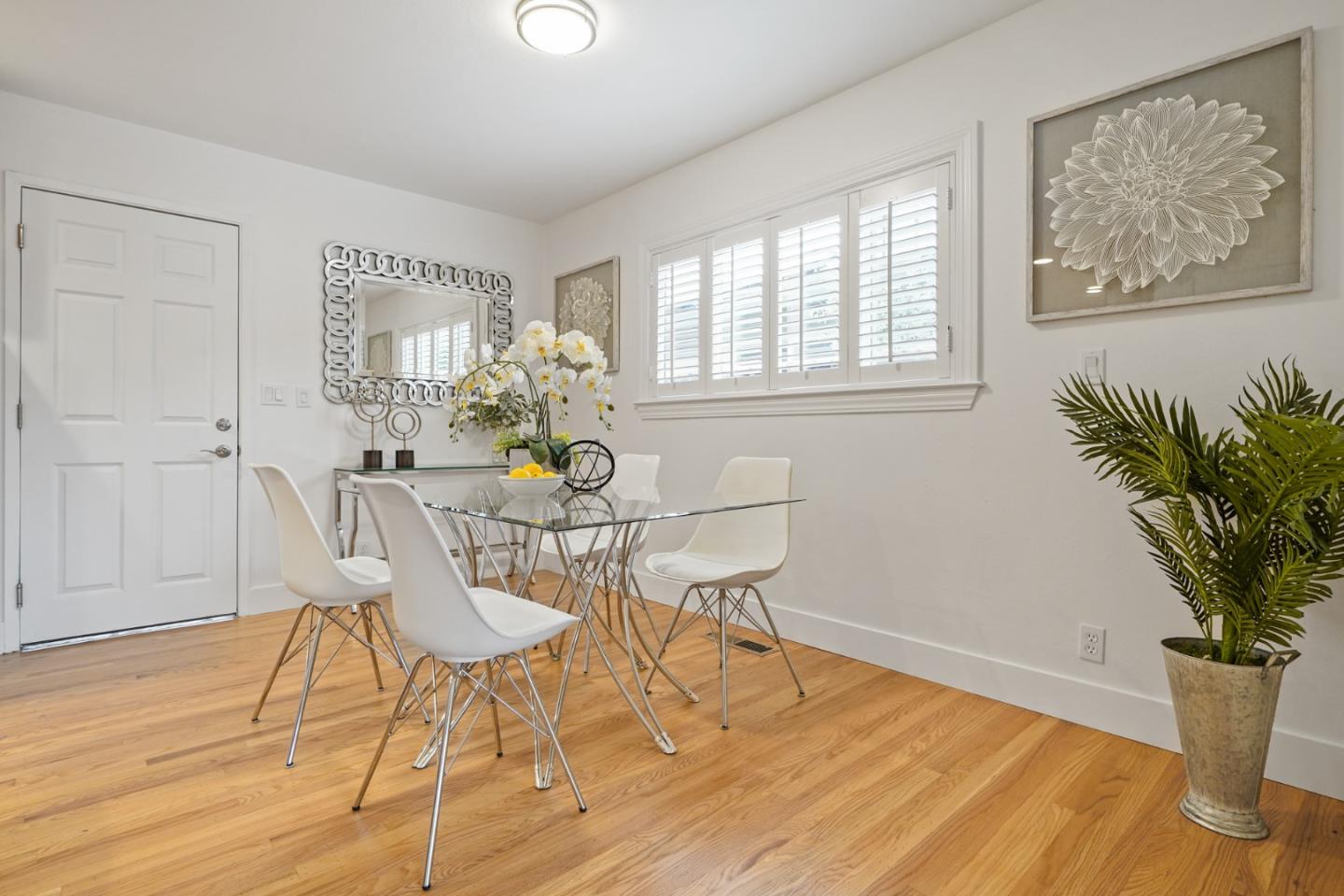 831 Flin Way Sunnyvale, CA 94087 - Photo 10 of 55 a view of a dining room with furniture window and wooden floor