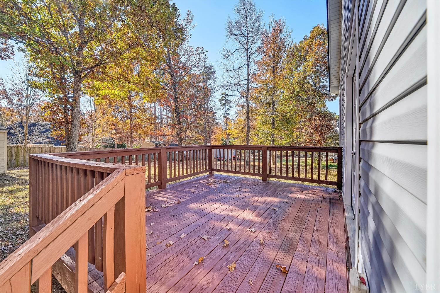1182 Dan River Church Road South Boston, VA 24592 - Photo 38 of 43 a view of a balcony with wooden floor and fence