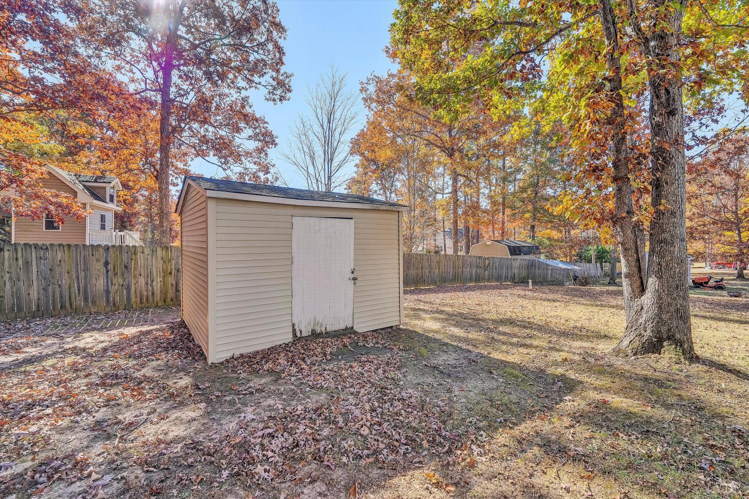 1182 Dan River Church Road South Boston, VA 24592 - Photo 39 of 43 a view of a backyard of the house