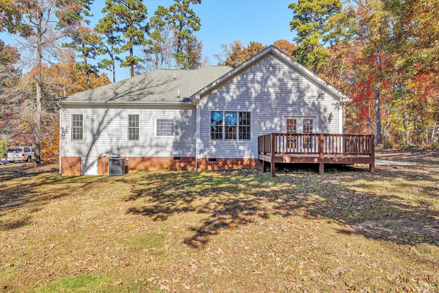 1182 Dan River Church Road South Boston, VA 24592 - Photo 41 of 43 a front view of a house with a yard covered with snow