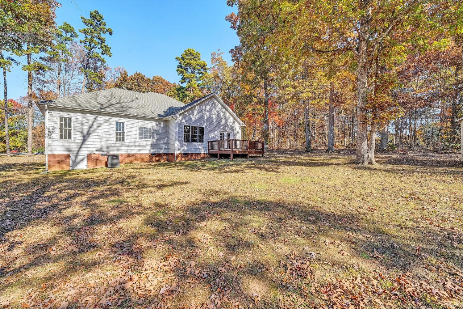 1182 Dan River Church Road South Boston, VA 24592 - Photo 42 of 43 a view of a house with a yard and sitting area