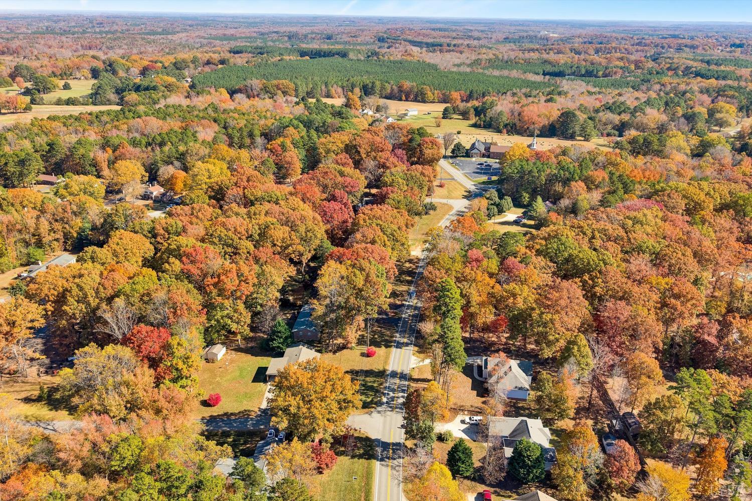 1182 Dan River Church Road South Boston, VA 24592 - Photo 7 of 43 an aerial view of residential houses with outdoor space