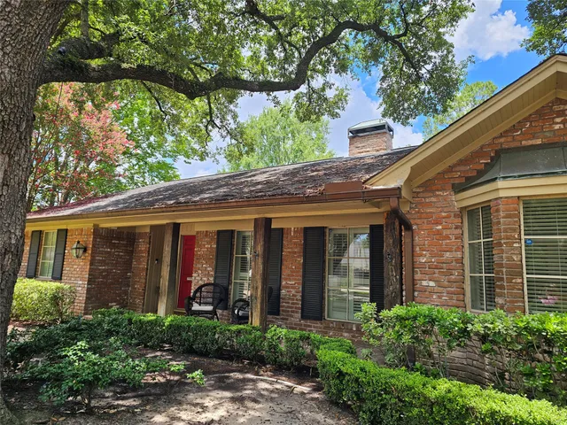 a view of a house with a garden