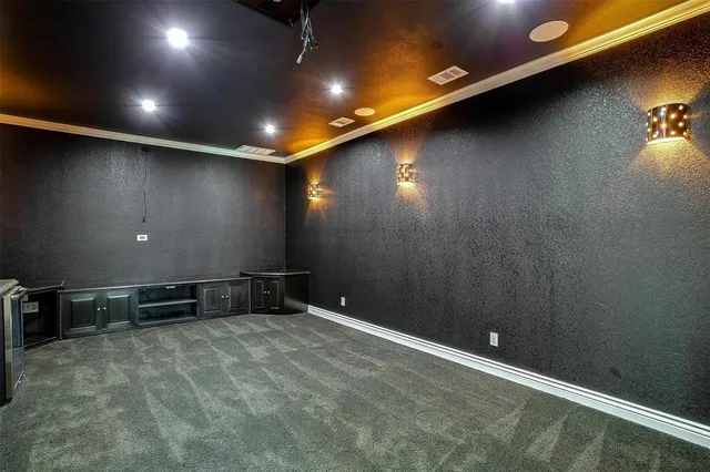 a bathroom with a sink toilet vanity and shower