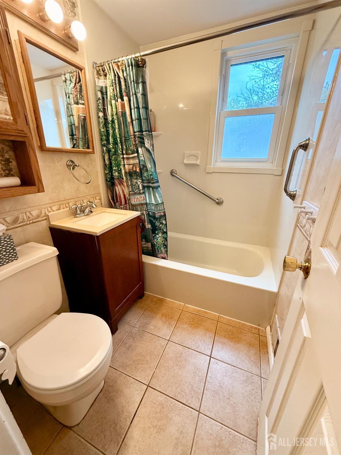 16 Marsad Drive Old Bridge, NJ 08857 - Photo 14 of 18 a bathroom with a sink a toilet and bathtub