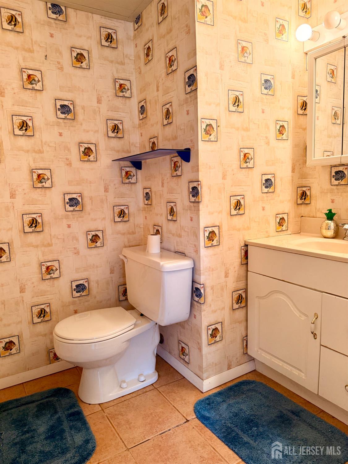 16 Marsad Drive Old Bridge, NJ 08857 - Photo 17 of 18 a white toilet sitting next to a shower curtain