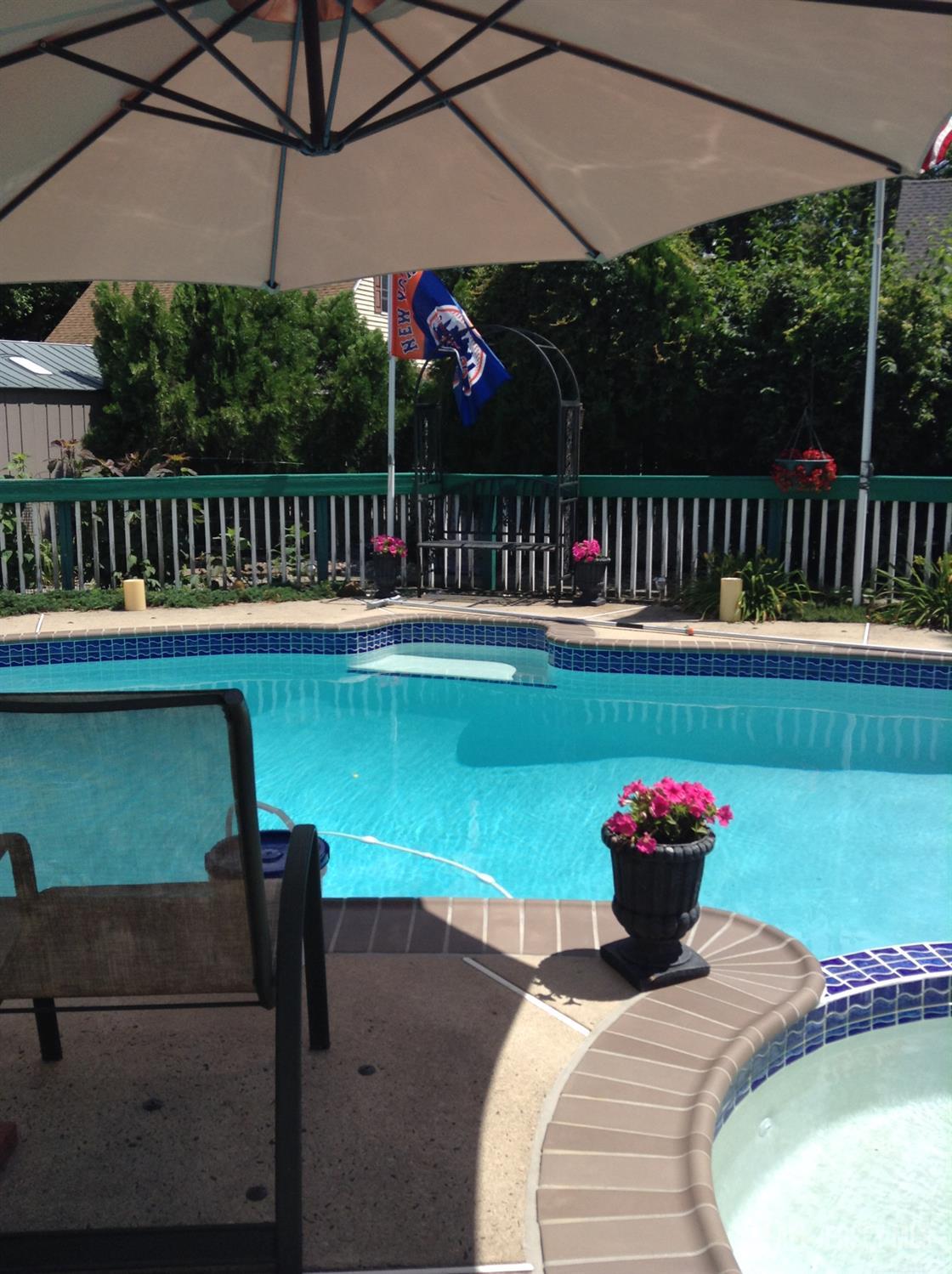 16 Marsad Drive Old Bridge, NJ 08857 - Photo 7 of 18 a view of a balcony with two chairs and a table