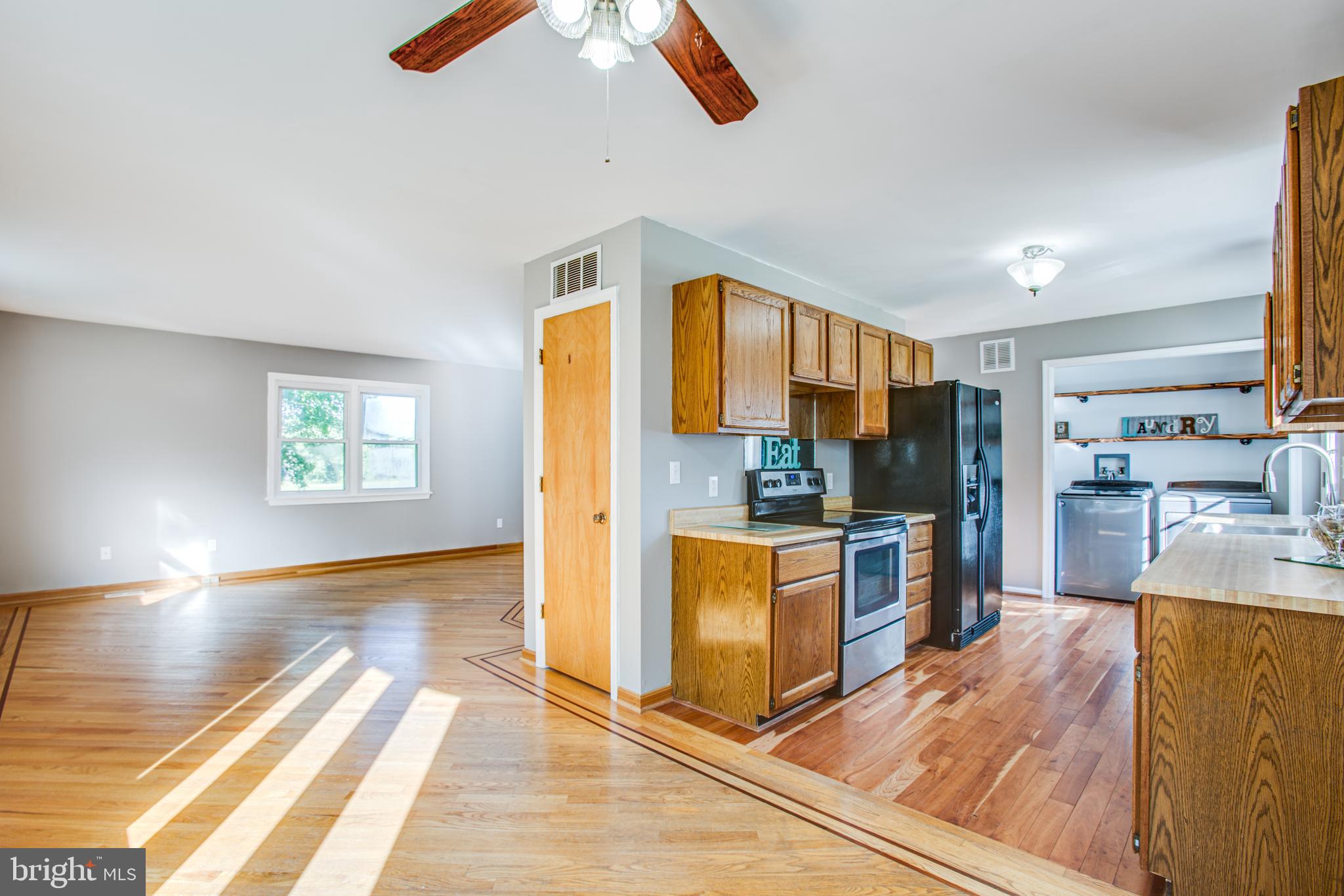 13103 South River Road Sumerduck, VA 22742 - Photo 4 of 37 Dining area opens to living room & kitchen