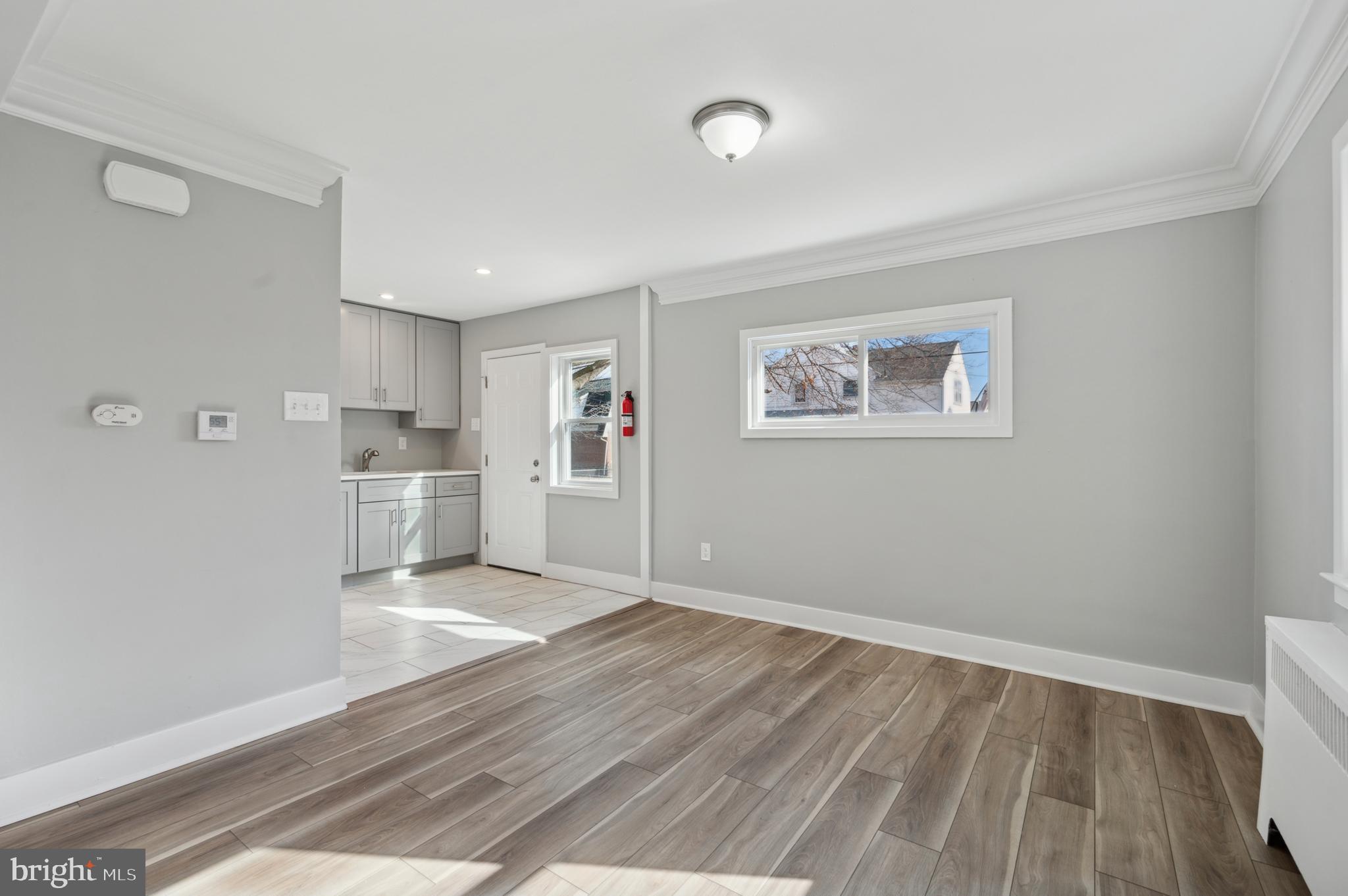 1230 MacDade Boulevard Woodlyn, PA 19094 - Photo 4 of 16 a view of kitchen and wooden floor