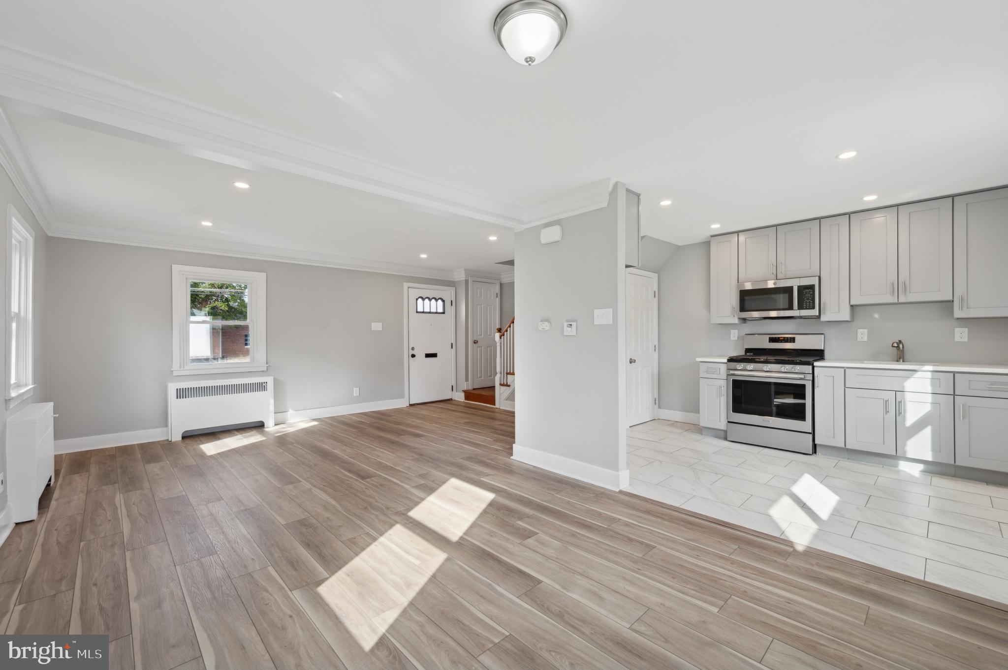 1230 MacDade Boulevard Woodlyn, PA 19094 - Photo 6 of 16 a view of kitchen and wooden floor