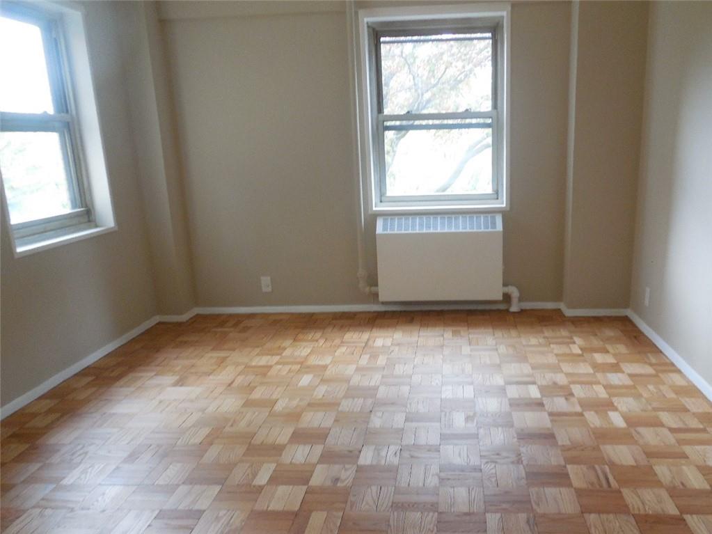 3 Fordham Hill Ovl, Unit 4A Bronx, NY 10468 - Photo 3 of 7 a view of room with window