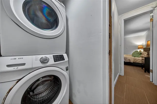 a utility room with dryer and washer