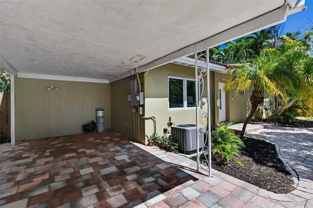 a backyard of a house with seating space
