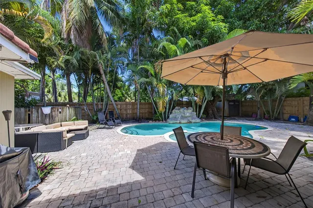 a view of yard with patio