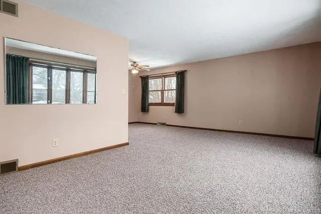 an empty room with windows