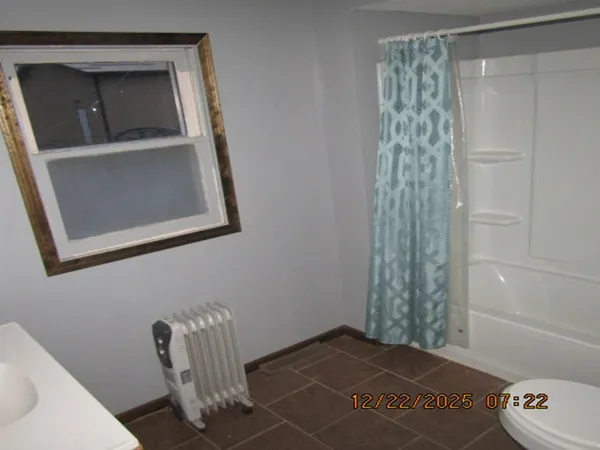 a kitchen with a stove and a refrigerator