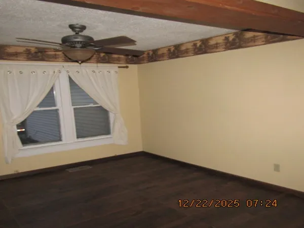 a view of small space in front of a house