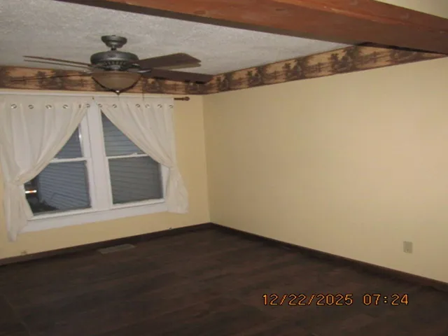 a view of small space in front of a house