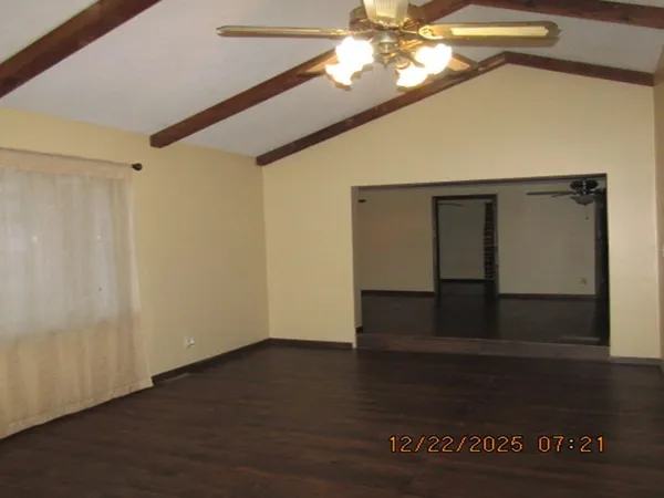 a view of small space with wooden floor