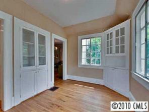 2143 Norton Road Charlotte, NC 28207 - Photo 4 of 8 a view of an empty room with a window