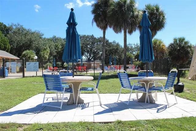 a view of swimming pool with a yard