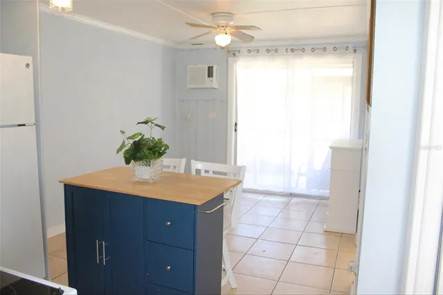 a bathroom with a granite countertop sink a mirror and a shower