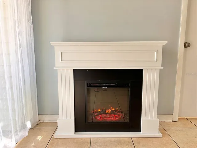 a living room with a fireplace