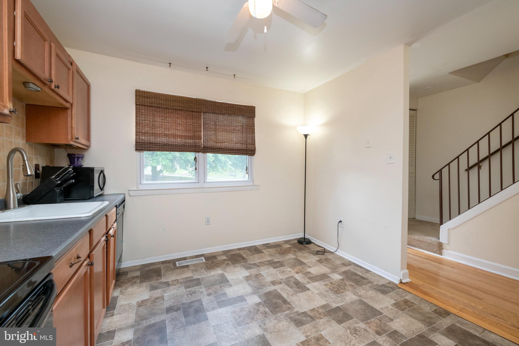 9376 Pan Ridge Road, Unit 9376 Parkville, MD 21234 - Photo 5 of 32 Kitchen with ceiling fan
