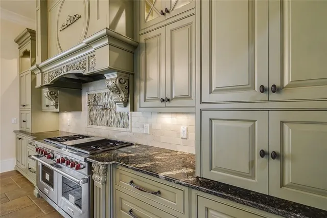 a view of a room with windows and chandelier