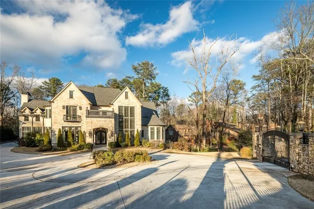 a view of multiple houses with a street