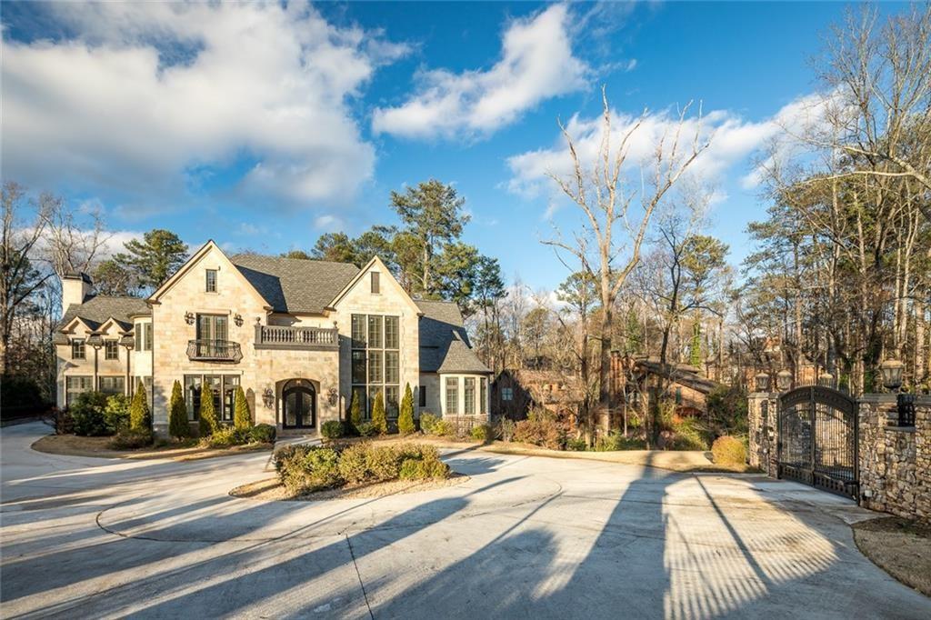 35 Mt Paran Road Northwest Sandy Springs, GA 30327 - Photo 2 of 61 a view of multiple houses with a street