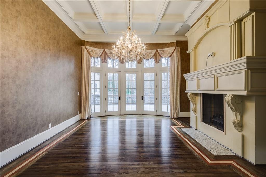 35 Mt Paran Road Northwest Sandy Springs, GA 30327 - Photo 21 of 61 a view of an empty room with wooden floor and a window