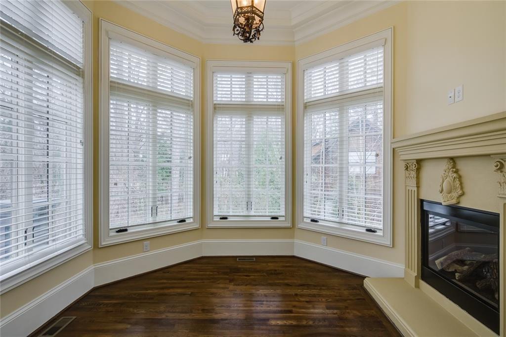 35 Mt Paran Road Northwest Sandy Springs, GA 30327 - Photo 23 of 61 a view of an empty room with wooden floor and a window