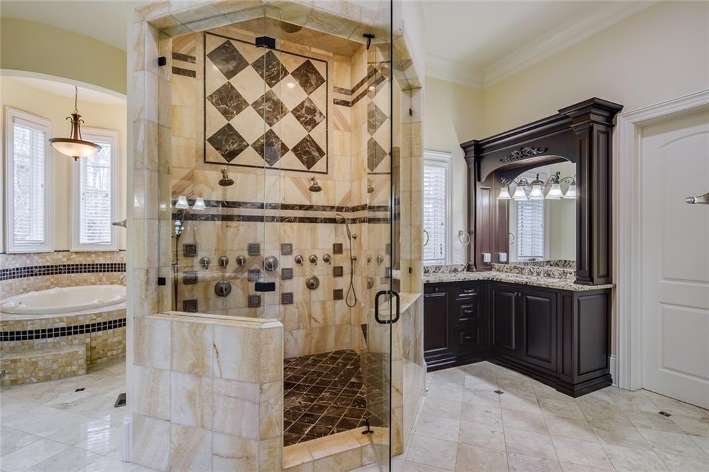 35 Mt Paran Road Northwest Sandy Springs, GA 30327 - Photo 24 of 61 a bathroom with a bathtub and a shower