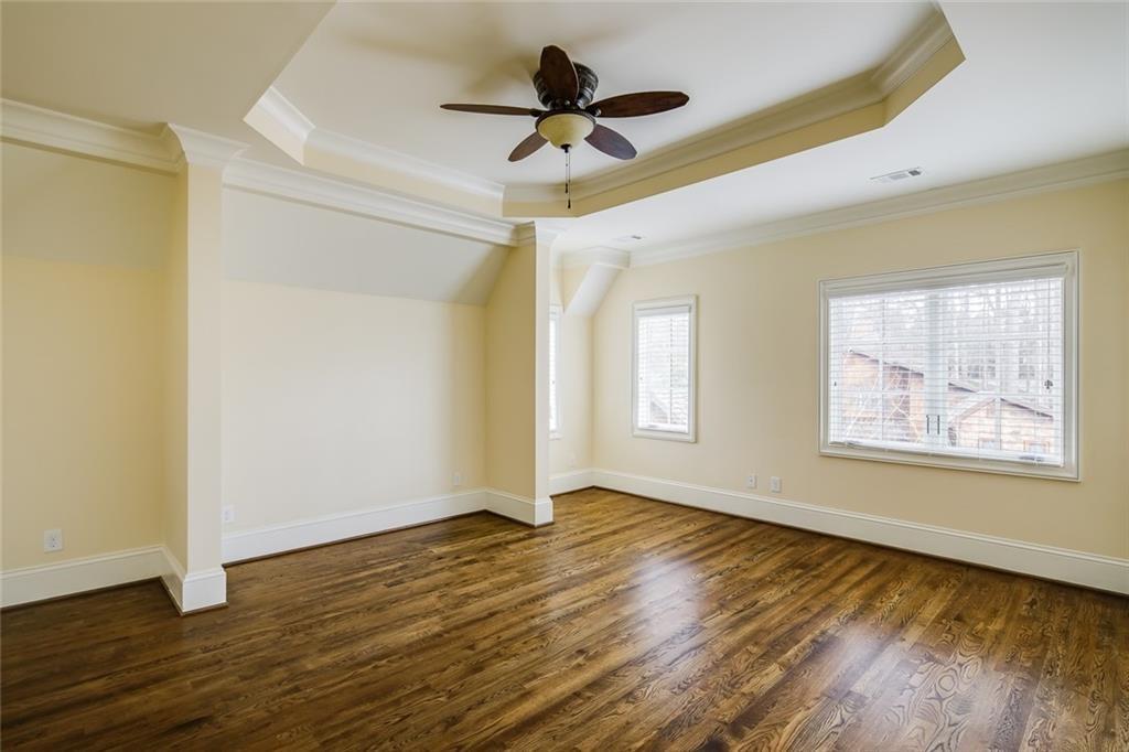 35 Mt Paran Road Northwest Sandy Springs, GA 30327 - Photo 30 of 61 a view of an empty room with wooden floor and a window