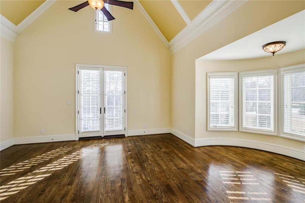 35 Mt Paran Road Northwest Sandy Springs, GA 30327 - Photo 33 of 61 a view of an empty room with wooden floor and a window