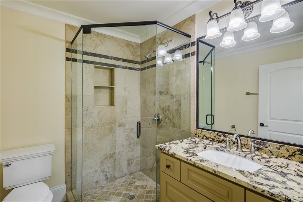 35 Mt Paran Road Northwest Sandy Springs, GA 30327 - Photo 34 of 61 a bathroom with a sink vanity granite toilet and shower